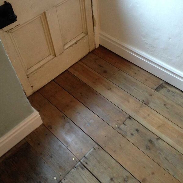 Floorboards back in place, cleaned and waxed.